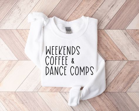 Weekends Coffee & Dance Comps Sweatshirt A sturdy and warm sweatshirt bound to keep you warm in the colder months. A pre-shrunk, classic fit sweater that's made with air-jet spun yarn for a soft feel and reduced pilling. * 50% cotton, 50% polyester * Pre-shrunk * Classic fit * 1x1 athletic rib knit collar with spandex * Air-jet spun yarn with a soft feel and reduced pilling * Double-needle stitched collar, shoulders, armholes, cuffs, and hem Dance Mom Sweatshirt Ideas, Dance Mom Competition Shirt, Dance Mom Outfits Style, Dance Mom Sweatshirt, Dance Mom Outfits, Dance Moms Outfits, Dance Parents, Dancer Gifts, Dance Mom Shirt