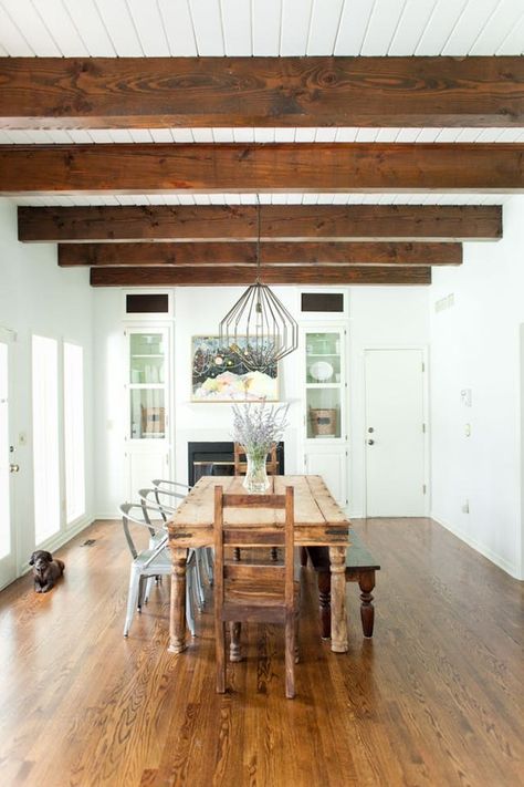 So Long, Popcorn Ceilings: 8 Transformative Overhead Architectural Hacks | your rental apartment or newly-built home didn't come with coffered ceilings or pressed tin tiles? Set your sights above that unsightly popcorn or drop ceilings you've been dealt. All eight of these ceiling hacks will lend architectural interest to a boring room—whether you channel intricate European plasterwork or rustic exposed wood beams is entirely up to you. Simple Ceiling Design, Faux Beams, Popcorn Ceiling, Tin Tiles, Wood Beam Ceiling, Style Deco, Exposed Beams, The Dining Room, Wood Ceilings