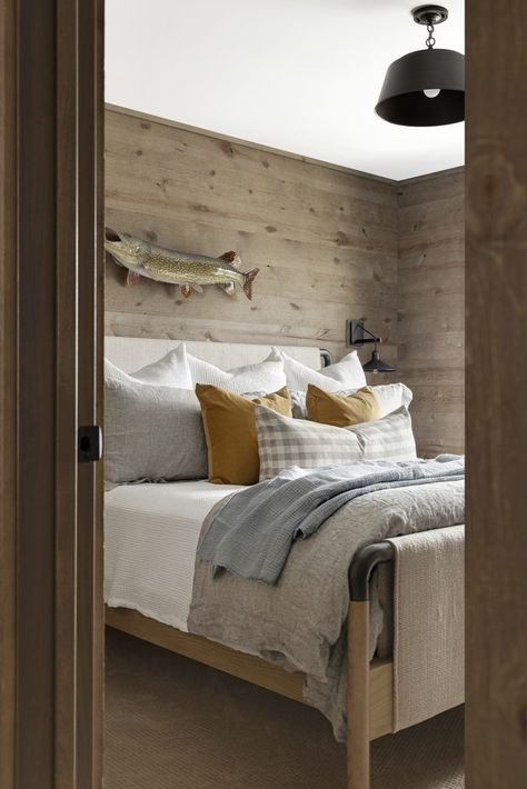 Take a peek inside this rustic yet refined lakeside home in Wisconsin Luxury Mountain Bedroom, Woodsy Basement Ideas, Coastal Lodge Decor, Lake House Colors, Modern Lake Cottage, Lake Cottage Interiors, Lake House Bathroom Ideas, Lake Cabin Interiors, Hunting Lodge Interiors