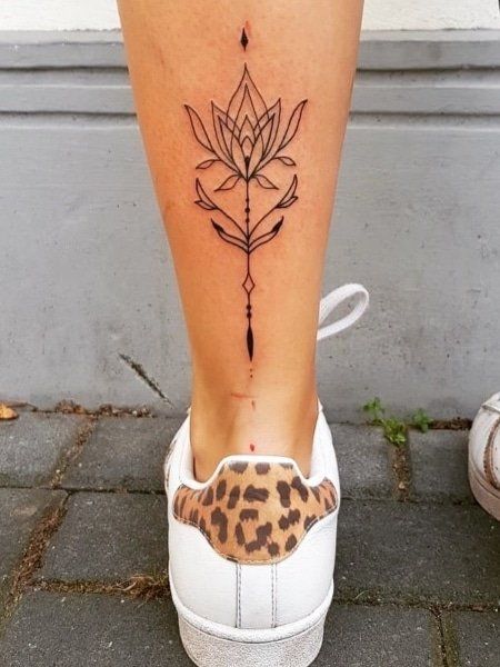 40 Best Leg Tattoos for Women in 2022 - The Trend Spotter Back Of Leg Tattoos Women, Lower Leg Tattoo, Traditional Chicano Tattoos, Simple Leg Tattoos, Calf Tattoos For Women, Leg Tattoos Small, Small Thigh Tattoos, Flower Leg Tattoos, Tato Paha