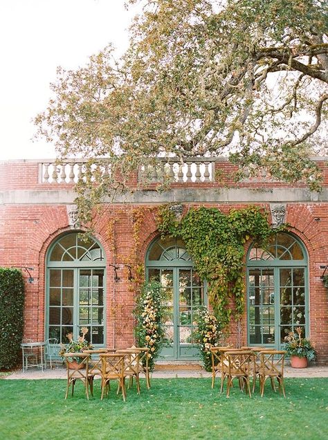 Brick Garden House with Vines and a Floral Ceremony Arch Brick Chateau, House With Vines, Floral Ceremony Arch, Large Sunroom, Brick Arches, Dumfries House, Floral Ceremony, Fall Garden Wedding, Architecture Classic