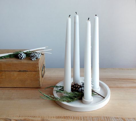 These beautiful candleholder will perfectly complete the elegant and modern interior of your home.  It can be decorate as a advent wreth with whatever comes to your mind, pine cones, christmas tree brunches, tree baubles. Enjoy the unique atmosphere during an evening sitting with your loved ones, when they illuminate the space around you.  Made from eco resin, looks like white stone. Dimensions: Diameter 7 inches (18 cm) White Candle Stick Holders, Pottery Advent Wreath, Advent Candle Holder Diy, Christmas Ceramic Decorations, Advent Candle Display, Modern Advent Wreath, Advent Candle Holder, Advent Candle, Pottery Christmas