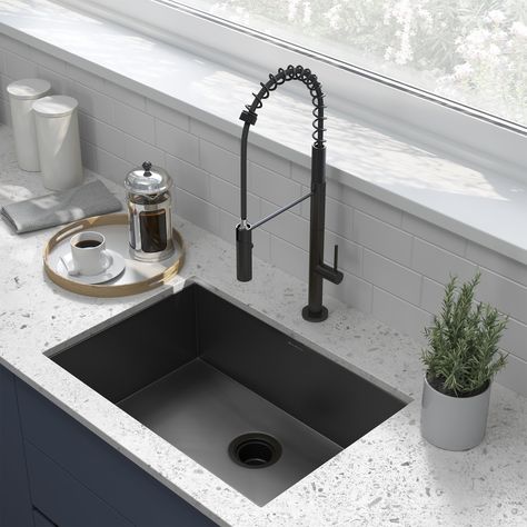 The Tourner Undermount Kitchen Sink is a stylish single basin sink with numerous finish options making it a perfect addition to any kitchen setting. Built with corrosion, rust and scratch-resistant stainless steel, this sleek and modern sink was built to withstand heavy use and high temperatures. Additionally, the sink has a deep spacious bowl, allowing for uninterrupted washing. FEATURES: 26 x 18” Stainless Steel Undermount installation Spacious Sink Depth – 8” Drain Hole Size - 3 ½” Noise Feat Contemporary Kitchen Sinks, Undermount Stainless Steel Sink, Single Basin Sink, Modern Kitchen Sinks, Under Sink Cabinet, Black Kitchen Sink, Countertop Material, Modern Sink, Undermount Sinks