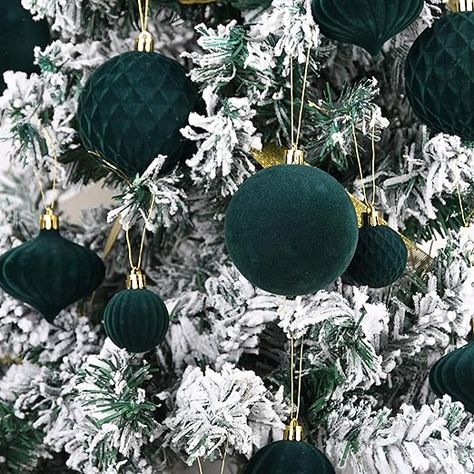 Flocked Christmas Tree Dark Green Ornaments, Dark Green Christmas Tree Ornaments, Flocked Christmas Tree With Green Ornaments, Christmas Tree With Dark Green Ornaments, Christmas Tree Hunter Green, Dark Green Velvet Christmas Decor, Dark Green And Black Decor, Flocked Christmas Tree Green Ornaments, Flocked Christmas Tree With Green Decor