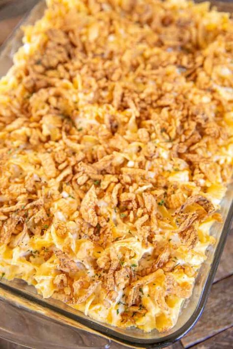 Million Dollar Chicken Noodle Bake – GREAT weeknight chicken casserole. Super easy to make and tastes like a million bucks!! Can make ahead and freeze for a quick meal later! Egg noodles, cooked chicken, cottage cheese, cream cheese, cream of chicken soup, sour cream, onion, garlic, cheddar cheese, and french fried onions. Everyone cleaned their plate and went back for seconds!