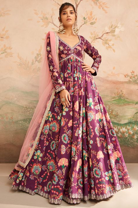 Featuring a wine anarkali in georgette base with floral print, including handwork, thread, stone and zari embroidery. It is paired with shantoon pants and a net dupatta. Style this designer anarkali set with ethnic dangler earrings and heels for weddings or festive occasions.#Perniaspopupshop #womenswear #ethnic #whatiworewastrending #ppuslove #anarkali #Georgette #Shantoon #weddingwear #festivewear Anarkali Georgette, Angrakha Anarkali, Georgette Anarkali Suits, Dupatta Style, Anarkali Dresses, Georgette Anarkali, Embroidered Anarkali, Zari Embroidery, Designer Anarkali