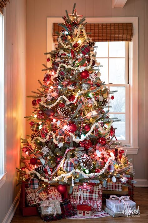 christmas tree with colored lights in living room.