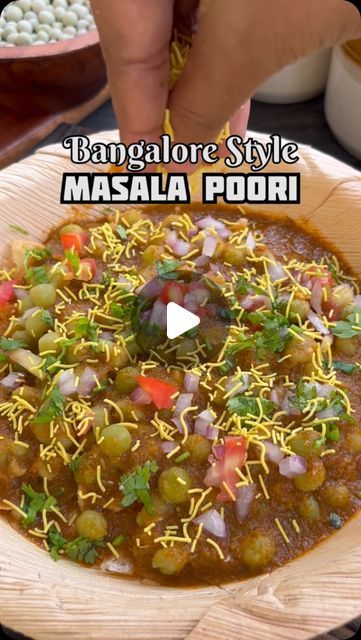 Mad Over Food on Instagram: "Tag all Masala Puri Lovers 💕.
Bangalore’s famous Street food, Masala Puri. 
Recipe: 
1. Soak 1/2 cup dry Green peas for 5hrs or overnight. Add to a pressure cooker. Pour 1 cup water, salt and cook for 5 Whistles on medium flame.
2. In a Pan heat 1 tbsp oil. Add 2 cloves, 1tsp Cumin, 1/2 inch cinnamon, 4 Garlic cloves, 1/2 inch ginger, 2 green chillies. Next add 1 sliced Onion and Sauté for 3-4 mins in high. 
3  Now add 1 sliced tomato and cook till it softens. Cool and transfer to a mixing Jar. To this add 1/3 cup mint leaves and 2/3 cup Coriander leaves. Add some water and blend to smooth paste. 
4. Heat 1 tbsp oil in a Pan and add Spices ( 1tsp each red chilli, Amchur, 1/2 tsp each Coriander, Cumin and Garam masala powder). Fry for a min on low. Now add the Masala Puri Recipe, Masala Puri, Famous Street Food, Garam Masala Powder, Masala Powder Recipe, Sliced Onion, Puri Recipe, Puri Recipes, Fair Food