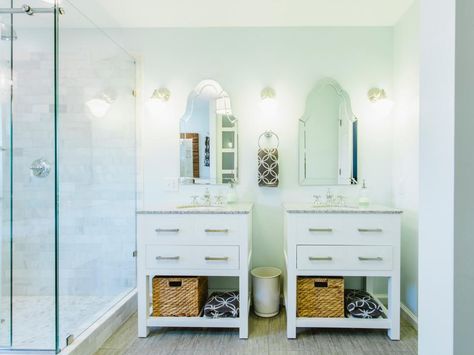 This bathroom features two single vanities placed side by side, to give a double vanity look without a double vanity price. Using white and soft gray colors with the clear glass shower door and mirrors amplify the space. Unique Bathroom Mirrors, Bathroom Vanity Designs, Small Bathroom Vanities, Transitional Bathroom, Vanity Design, Double Vanity Bathroom, White Vanity, Unique Bathroom, Trendy Bathroom