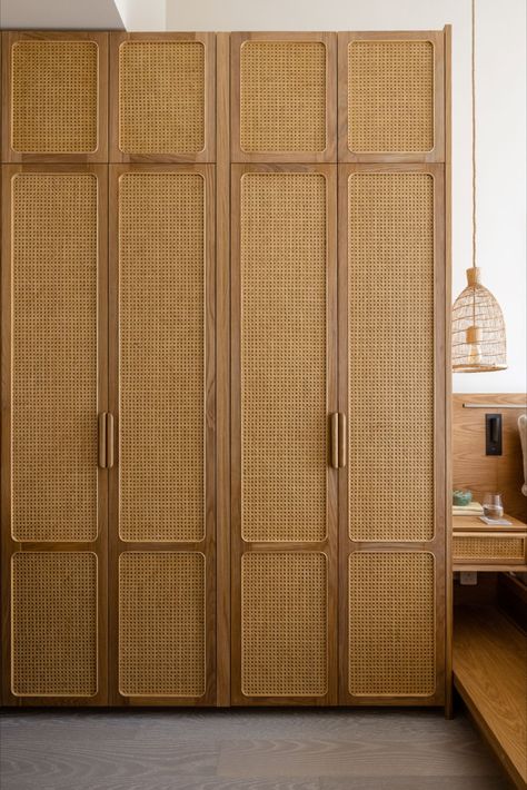 Our storage cabinet keeps things neatly organized with its adjustable shelves in the interior, and drawers and open shelves with adjustable heights. This cabinet is designed to be a sustainable piece of furniture with its solid wood handles, FSC certified solid wood trims, and bamboo and rattan finish. Wardrobe Design Bedroom Boho, Boho Wardrobe Closet, Bohemian Wardrobe Design, Rattan Finish Wardrobe, Bamboo Wardrobe Doors, Wooden Finish Wardrobe, Rattan Door Cabinets, Modern Wardrobe Design Ideas, Rattan Wardrobe Design