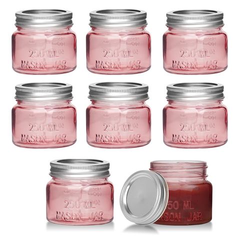 PRICES MAY VARY. SET OF 8 CUTE PINK CANNING JARS: The colors are cute, just putting them in the kitchen will make the mood even happier! HIGH QUALITY MINI MASON JARS: Made of food grade glass, thick and durable. Reusable throughout the year. Compact and portable, with a leak proof lid. VERSATILE USES: You can use it as spice jars, candle jars, honey jar, small glass containers, baby food jars, honey jars, overnight oats jars, candy jars, jelly jars, jam jars, or decorative jar for small parts. I Repurposed Candle Jars, Jelly Food, Small Glass Containers, Honey Jam, Pink Mason Jars, Gold Mason Jars, Transparent Bottle, Weck Jars, Honey Jars