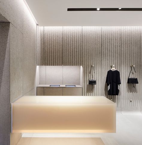 Minimalist Retail Display, Fitting Room Lighting, Retail Lighting Design, Bond Street London, Store Concept, Retail Lighting, Concrete Walls, Retail Store Design, Store Design Interior