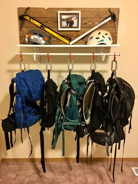 Backpack hanger with ice axes and helmets Backpacking Gear Storage, Gear Room Organization, Outdoor Gear Organization, Outdoor Gear Storage, Camping Gear Storage, Backpack Hanger, Adventure Room, Gear Room, Camping Storage