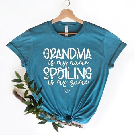 Custom Grandma Shirt ,Nana Shirt,Mimi Shirt,Granny Shirt,Funny Grandma Shirt, Cute Grandma Shirt, New Grandma Shirt,Grandma Tees 👉Click to buy from Etsy Shop :🛒 http://www.EpicFashionUs.etsy.com/listing/1186825916/custom-grandma-shirt-nana-shirtmimi 📌Store Link in Bio Welcome to EpicFashionUS! Its great to see you here! We prioritize one thing here and that is quality and customer satisfaction. 👉Our Tshirts are: -Made from 4.2-ounce cotton -All solid colors are 100% cotton and all heath... Funny Grandma Shirts, Granny Shirts, Cute Grandma, Funny Grandma, Nana Shirts, Grandma Shirt, New Grandma, Grandma Shirts, Unisex Tshirt