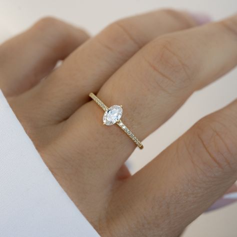 Oval ring that is beautiful and versatile! Perfect for multiple uses - engagement ring, engagement placeholder ring, stacking ring, anniversary gift, promise ring, and many more uses!  - - - D E T A I L S - - - * Made of 925 Sterling Silver * We use a THICK, DURABLE 14k Gold or Rhodium plating - for a piece that will last you years to come! * VERY HIGH QUALITY * Available in sizes 4-10 * Stone Size: 4x6 mm * Nickel-Free & Hypoallergenic * We use the highest grade cubic zirconia stones for an authentic diamond look! Comes in a cute gift box, ready for gift-giving! Made with 100% Pure Love! ♡ Happy to answer any questions you may have! 🥰 Let's Connect! 🥰 IG: samijewels_ Oval Promise Rings, Simple Promise Rings Gold, Promise Rings For Couples Gold, Promise Rings Small, Wedding Rings Engagement Dainty, Small Moissanite Engagement Ring, Crazy Wedding Rings, Women Engagement Rings Gold, Engagement Ring Short Fingers