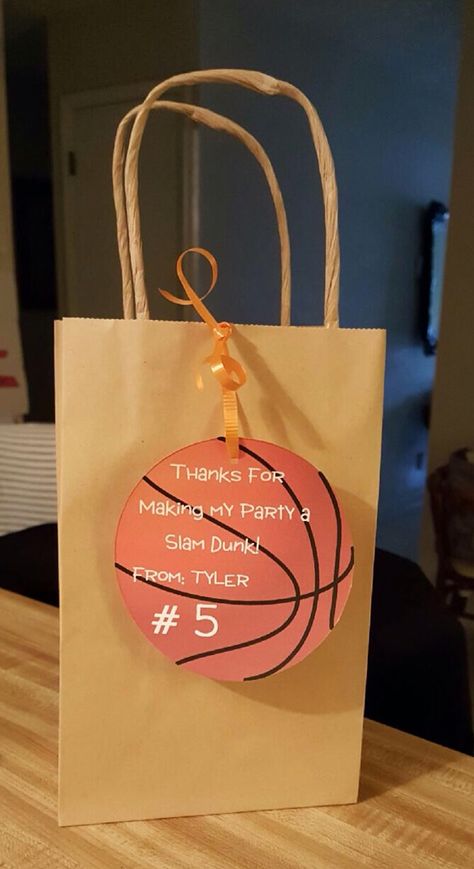 I created a template to make these SIMPLE goodie bags. I bought some stock paper, ribbon and a hand held hole punch and these CUTE simple gift bags to go with my sons basketball theme party!  Easy peasy! Basketball Gift Bags, Team Party Ideas, Basketball Banquet, Basketball Themed Birthday Party, Basketball Ideas, Basketball Theme Party, Basketball Birthday Parties, Sports Birthday Party, Basketball Party