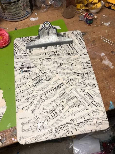 vintage style decorative clipboard covered with vintage music paper (900x1200) Music Paper Crafts Diy, Decoupage Clipboards, Clip Board Ideas, Vintage Clipboard, Decorative Clipboards, Scrapbook Paper Wall Art, Clipboard Wall Art, Clipboard Crafts, Hymnal Crafts