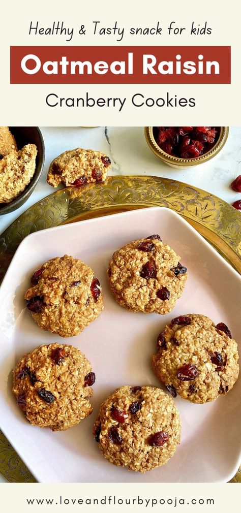 Healthy and tasty, these eggless oatmeal raisin cranberry cookies make for a great anytime snack! The texture of these cookies is rustic, but has a soft center, crispy edges, a cinnamony flavor, sweet sour combination of cranberries and raisins & is loaded with oats. Try this easy & delicious cookie recipe at your home today! | oatmeal cookies with quick oats | healthy cookie recipes for kids | eggless cookies | Easy eggless baking recipes Oatmeal Cookies With Quick Oats, Cookies With Quick Oats, Healthy Baked Snacks, Easy Delicious Cookies, Oatmeal Raisin Cookies Healthy, Oat Cookie Recipe, Eggless Cookie Recipes, Eggless Cookies, Cookie Recipes For Kids