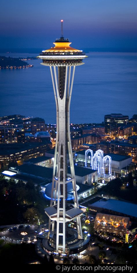 The Seattle Space Needle at twilight.  Photograph by Jay Dotson Seattle Space Needle Pictures, Desk Tops, Seattle Space Needle, Seattle Travel, Visit Seattle, Space Needle Seattle, Scenic Pictures, Rain Poncho, Travel Illustration