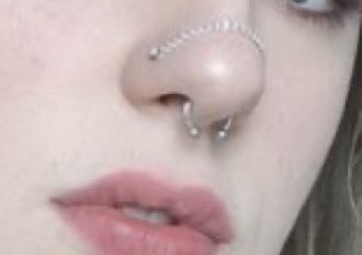 Double nose chain piercing Over The Nose Chain With Septum, Nose Peircings Double Chain, Over Nose Piercing Chain, Double Nose Piercing Chain Across, Chain Over Nose Piercing, Connected Nose Piercing Chain, Nostril Piercing With Chain, Heart Nose Chain, Alt Nose Piercing