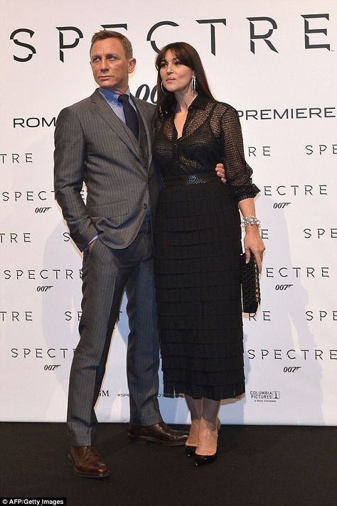 So chic: A pair of patent black heels and a clutch bag finished off Monica's ensemble, whi... James Bond Outfits, Bond Outfits, Sheer Black Shirt, Crockett And Jones, Black Patent Heels, Italian Actress, Sheer Shirt, Daniel Craig, Monica Bellucci