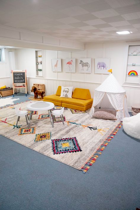 Basement Playroom Makeover On A Budget - The New York Stylist Low Ceiling Playroom, Finished Basement Playroom, Boho Basement, Basement Play Area, Kids Playroom Basement, Kids Playroom Ideas Basement, Cheap Vinyl Flooring, Family Room Playroom, Ceiling Basement