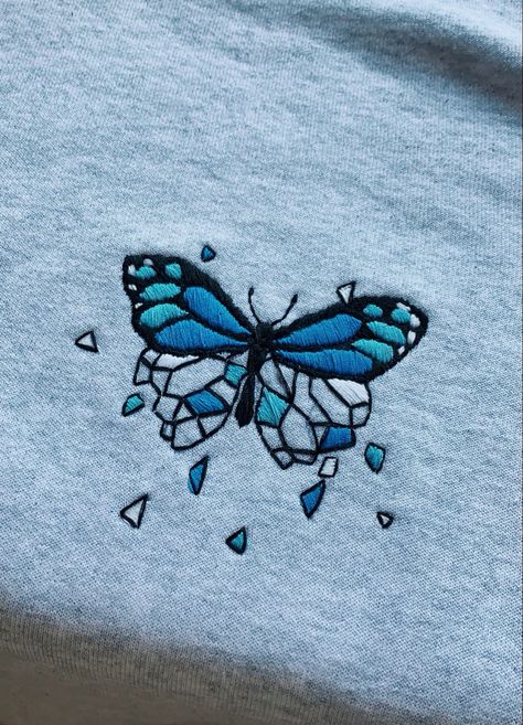 blue butterfly embroidery design on grey sweatshirt Cute Embroidery Tshirt, Blue Butterfly Clothes, Blue Shirt Embroidery, Embroidery Designs On Hoodies, Embroidery Designs On Sweatshirts, Embroidery Hoodie Designs, Tshirt Embroidery Diy, Embroidery Patterns Butterfly, Embroidery Designs Tshirt