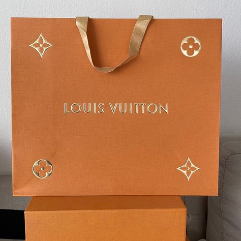 Louis Vuitton Holiday Gift Bag Size : 15" L X 13"H X 6"W Gift Bags Given During Christmas Limited Edition Gold Lettering Luxury Paper Bag, Branded Gift Bags, Paper Bag Design, Christmas Luxury, Louis Vuitton Gifts, Holiday Gift Bag, Orange Paper, Jewelry Ads, Gold Lettering