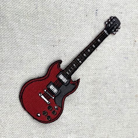 Top-quality iron-on embroidered patch. This guitar patch is 4-inches long Senior Jackets Patches, Senior Jackets, Toro Inoue, Battle Jacket, Iron On Embroidered Patches, Cool Patches, Treble Clef, Sticker Patches, Music Design