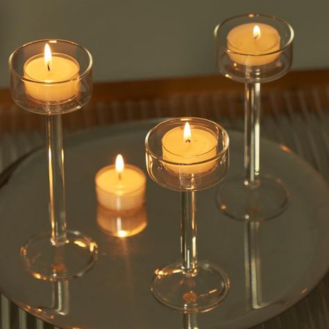 PRICES MAY VARY. Willceka modern glass votive candle holders make for a serene scene on a console or coffee table. With three sizes to work with, you can play with scale to create a dynamic design or keep it simple with a few strategically placed around your home. Crafted from mouth blown glass which stands for multiple use; Thickened and solid glass wall, making this candle holder set sturdy and durable enough. To enhance the visual effect, we offer 3 different heights: 5.1", 5.9", 6.7". The di Candle Holders Glass, Romantic Candle Light Dinner, Tea Candle Holders, Tea Light Candle Holders, Glass Votive Candle Holders, Party Table Settings, Tea Light Holders, Candle Table, Candle Light Dinner