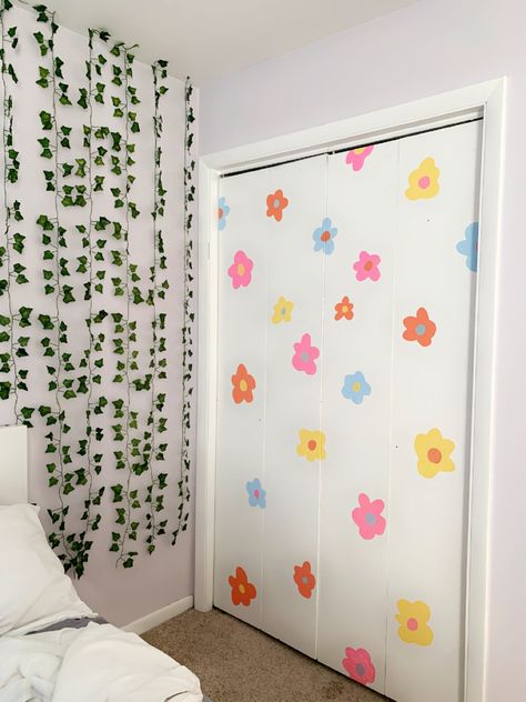 flower painted closet door #indie #painting #aesthetic #roomdecoration #teenbedroomideas Aesthetic Bedroom Wall Paint, Aesthetic Room Decor Flowers, Cute Painted Doors Aesthetic, Painted Room Walls Aesthetic, Painted Wall Ideas Aesthetic, Aesthetic Painting For Bedroom, Flowers On Door Painting, Wall Paint Ideas Bedroom Aesthetic, Bedroom Door Ideas Painting