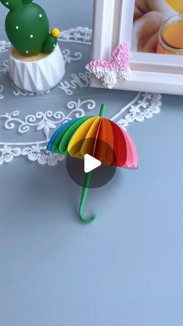 paper crafts creator on Instagram: "Let’s make a simple and beautiful rainbow umbrella together! #parentchildhandcraft #handmade #diy #handmade #origami  paper craft  ideas" Umbrella Diy Craft, Umbrella Craft For Kids, Umbrella Craft, Origami Paper Craft, Rainbow Umbrella, Paper Umbrella, Folding Paper, Paper Umbrellas, Paper Craft Ideas