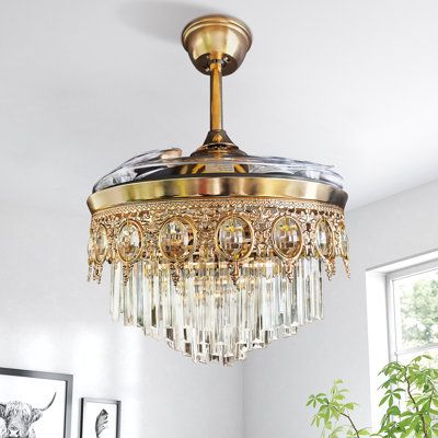 This fan was inspired by European royal palaces and incorporates vintage medieval Baroque relief style, it's a fantastic combination of functional ceiling fan and crystal chandelier! All the metal parts are covered by A-grade champagne-gold plating, and the metal frame was hand-made Baroque relief and egg-shaped crystal balls, 4-layer crystal bars are hanging on the bottom, making it absolutely stunning with lights turned on! It definitely will be a showstopper and make your room full of vintage Kitchen Lights With Fan, Victorian Ceiling Fan, Light Medallion Ceiling, Ceiling Fans With Chandelier Light, French Ceiling Fan, Small Chandelier Dining, Chandelier Fans Ceiling, Pretty Ceiling Fan, Royal House Interior