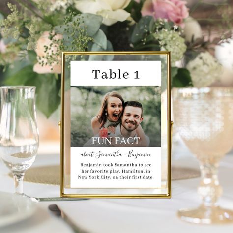 These creative, Fun Facts about the bride and groom wedding table numbers will entertain your reception guest with fun and interesting information about your love story and personalities. The black-and-white design features one of your photos and is embellished with hand-lettered calligraphy script and a stylish serif font. If you need assistance customizing this product or would like me to create additional, matching items, please contact me at admin@albamarie.com. I'd be happy to help! Note: T Personal Centerpieces Wedding, Table Numbers Wedding With Photos, Pictures For Table Numbers, Wedding Centerpieces Photos, Cute Wedding Table Ideas, Wedding Guest Seating Chart Ideas, Table Numbers With Photos, Wedding Numbers Table Ideas, Wedding Table Assignment Ideas