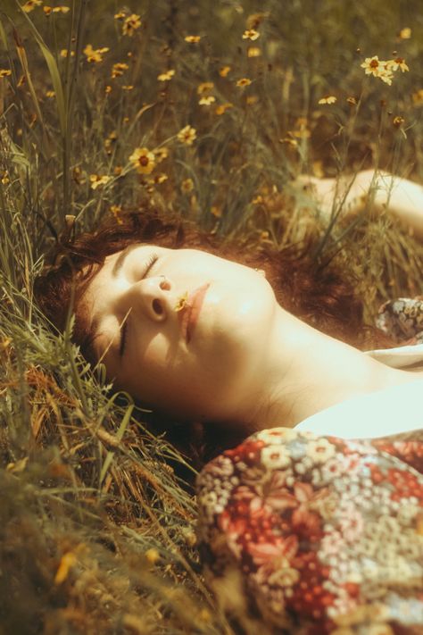 Laying In Wildflowers, Person In Field Of Flowers, Field Reference Photo, Cinematic Field Photography, Sitting In A Field Of Flowers, Woman Laying In Field, Medow Photo Aesthetic, Frolicking In A Field Aesthetic, Hazy Photoshoot