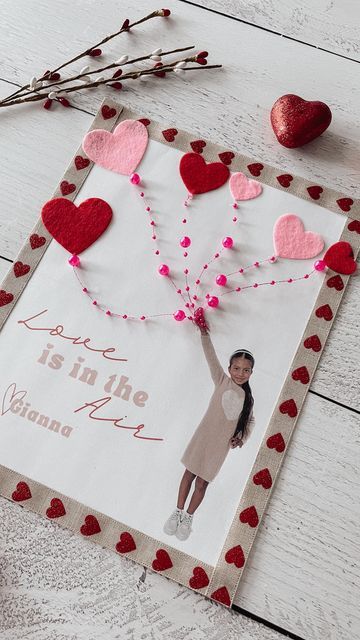 Kiara Sierra on Instagram: "Love is in the air 💕🎈 . Handcrafting Cupid-Approved Valentine’s Bliss 💘 So in LOVE with how cute these turned out 😍 . . How to: 1. Take a picture of your little cutie with their arm in air. 2. Hold down on picture and press copy. 3. Open pages app and paste in your photo. *Edit* 4.Visit everything-always.com to download your free template! 5. Add this photo into your pages document and size 6. Print and decorate 💕💘 . Ribbon & Felt hearts stickers found at @dollartree 👏🏼 . #valentinesday #valentines #mylittlevalentine #keepsake #vdaycrafts #valentinesdaycrafts #ideasforkids #kidscrafts #dollarstorecrafts #diy #montessori #preschool #playandlearn #playathome #sensoryplay #learningthroughplay #preschoolactivity #montessorikids #playbasedlearning #montessori Love Is In The Air Craft For Kids, Love Is In The Air Preschool Craft, Vday Crafts, Diy Montessori, Playbased Learning, Montessori Preschool, Take A Picture, Dollar Store Crafts, So In Love