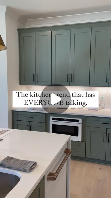 Wholesale Cabinets Warehouse on Instagram: "Green kitchen cabinets are here to stay! 🗣️   Here’s 10 reasons why you should consider green as your next choice of kitchen cabinet color! 🍃👇  ⏳ Timeless Elegance: Green (specifically @sherwinwilliams Dried Thyme) is a classic and versatile color that can bring a sense of elegance to your kitchen. For instance, this kitchen would not look as elegant if the cabinets were white.   🧩 Versatile Complement: Green cabinets can be paired with a wide range of colors. From neutral tones to bold contrasts, green allows for versatile and personalized design options!   🌿 Natural Connection: The color green is often associated with nature, and can create a sense of tranquility and connection to the outdoors in your kitchen space.   😌 Calming Atmosphere White Quartz Countertop Green Cabinets, Green And White Kitchen Cabinets, Light Green Cabinets, Kitchen Cabinets With Black Appliances, Kitchen Cabinet Color, Sage Green Kitchen, The Color Green, Black Appliances, Dried Thyme