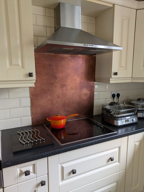 https://flic.kr/p/2qerVzw | Aged Copper Splashback | This stunning 1.2mm thick copper sheet features a beautiful aged patina, making it a striking addition to any kitchen as a splashback. Unlike many cheaper alternatives, our copper sheets maintain excellent rigidity, allowing for easy handling and installation. Each splashback is custom-made to suit your specific dimensions, ensuring a perfect fit for your space. The unique patina on every piece guarantees that no two splashbacks are alike, adding a touch of individuality to your kitchen. Additionally, each splashback is protected with a high-quality clear lacquer finish, enhancing its durability and preserving its stunning appearance. Copper Splashback Kitchen, Copper Backsplash Kitchen, Viking Garden, Copper Splashback, Copper Backsplash, Aged Copper, Kitchen Splashback, Copper Sheets, House Goals