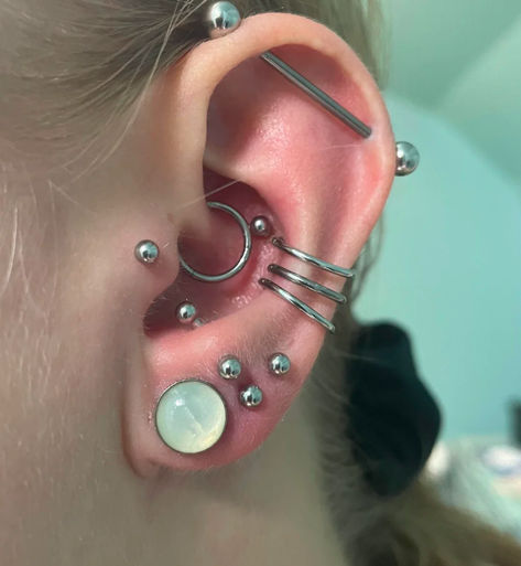 Vertical Ear Lobe Piercing, Industrial Piercing On Both Ears, Silver Ear Piercing Stack, Double Industrial Piercing, Ear Piercing Ideas With Industrial, Bar Ear Piercing, 3 Lobe Piercings, Gauged Ears, Piercing Inspiration