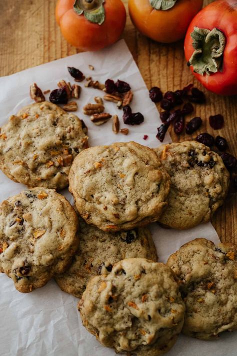 'Tis the season for cookies, and these Fresh Persimmon Cookies are among the very best. Tender, cakey, sweetly spiced and fruit-laced cookies are loaded with texture from crunchy nuts and chewy raisins or dried cranberries in this persimmon cookie recipe. Made with just 12 ingredients and 10 minutes of prep, these delicious drop cookies are always a favorite during the cooler months. Keto Persimmon Cookies, Monk Fruit Cookie Recipes, Best Persimmon Cookies Recipe, Dried Persimmon Recipes, Persimmon Cookies Recipe, Yule Dinner, Persimmons Recipes, Persimmon Cookie Recipe, Pomegranate Cookie