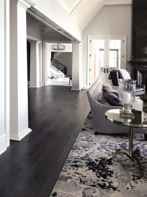 Dark Wood Wide Plank Floors, Modern Home Dark Floors, Black Vinyl Flooring Living Room, Black Floors Grey Walls, Vinyl Flooring Black, Luxury Hardwood Floors, Black Wooden Floor Living Room, Black Floor House, Dark Plank Flooring