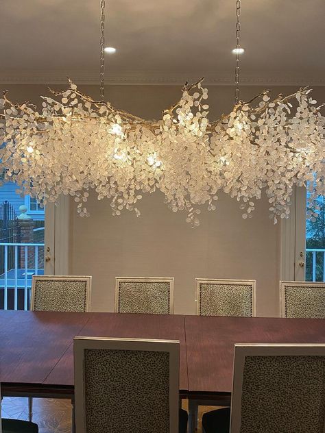 Like dewdrops under a forest canopy, the Shiro Noda Chandelier collection displays glistening glass coins that cascade from organic leaves and branches. A modern nod to nature, this collection is a natural in contemporary settings. This chandelier is large enough to hang in a great room, foyer, or dining and living rooms with high ceilings. If you have any questions about our products, please contact us and we will get back to you within 24 hours.   Product Size Size: Dia 65cm x H 65cm / ∅ 25. Leaves And Branches, Glamour Vintage, Forest Canopy, Crystal Pendant Lighting, Dining And Living Room, Elegant Dining Room, Crystal Light, Vintage Glamour, Displaying Collections