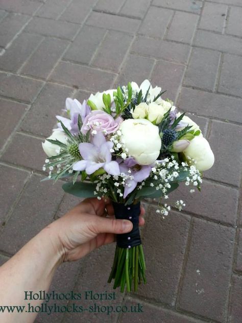 Bridesmaid hand tied wedding in purple, blue and white. Flowers including white Duchess du Nemours Peony, Eryngium thistle and Gypsophila. From £50 Weeding Themes, Small Bridal Bouquet, Thistle Bouquet, Flower Arranging Tutorial, Small Bridal Bouquets, Wedding August, Lavender Wedding Flowers, Newton Abbot, Button Bouquet