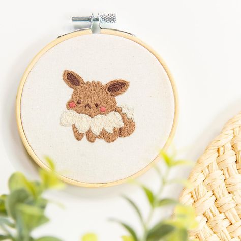 NEW PATTERN✨ Just added this adorable Pokémon Eevee embroidery pattern to the Etsy shop! Can’t wait to see your creations💕 #shopjamiephoto #jamiephotodiy #eeveelution #eevee #pokemon Pokemon Embroidery Designs, Eevee Embroidery, Pokemon Punch Needle, Pokemon Embroidery Pattern, Eevee Pattern, Pokemon Embroidery, Pokémon Eevee, Pokemon Eevee, Diy Photo