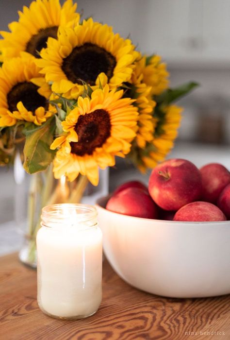 Sometimes it's hard to find fresh pumpkins early on in the autumn, so these simple early fall kitchen decorating ideas take advantage of the abundant produce of August and September. Learn Simple Early Fall Kitchen Decorating Ideas! #fall #falldecor #falldecorating #autumn #sunflowers #kitchen #fallinteriors September Decorations, Autumn Sunflowers, Warm Kitchen, Fall Kitchen Decor, Small Kitchen Decor, Kitchen Decorating Ideas, Fall Kitchen, Boho Kitchen, In Season Produce