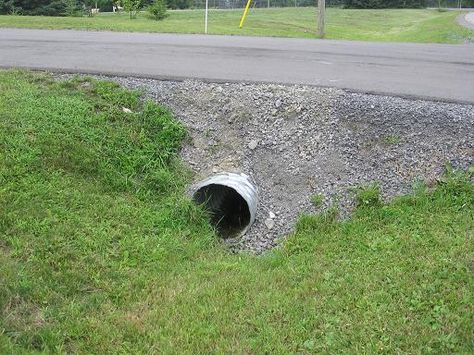 What is the best way to stop the crushed stone on driveway from falling into ditch above the culvert? The driveway is paved, but the stone u... Driveway Culvert Landscaping Ideas, Culvert Ideas Driveways Drainage Ditch, Landscaping Around Driveway Culvert, Driveway Culvert Retaining Walls, Culvert Retaining Wall Driveways, Culvert Retaining Wall, Diy Culvert Ideas, Driveway Culvert Ideas, Culvert Landscaping Ideas Driveway