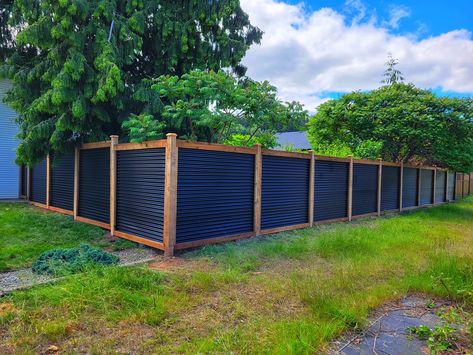 The Ultimate Guide for Corrugated Metal Fence Panels – BarrierBoss™ Wood And Sheet Metal Fence, Corrugated Metal Fences, Corrugated Tin Fence, Corrugated Metal Wall Bedroom, Tin And Wood Fence, R Panel Fence, Metal Siding Fence, Corrugated Iron Fence, Diy Corrugated Metal Fence