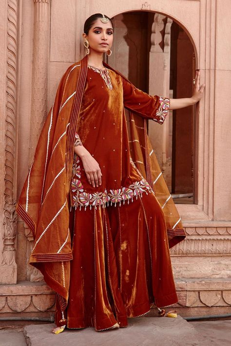 Buy Ajiesh Oberoi Gold Velvet Keyhole Neck Kurta Gharara Set Online | Aza Fashions Velvet Gharara Designs, Garara Design, Tassel Dupatta, Gharara Designs, Velvet Kurta, Velvet Lehenga, Pink Kurta, Antique Gold Jewelry Indian, Short Kurta