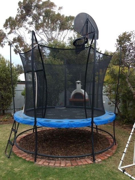 Cool Trampoline Ideas, Rocks Under Trampoline, Landscaping Under Trampoline Ideas, Above Ground Trampoline Landscaping, Trampoline Base Ideas, Under Trampoline Ideas Backyards, Gravel Under Trampoline, Under Trampoline Landscaping, Backyard Trampoline Landscape