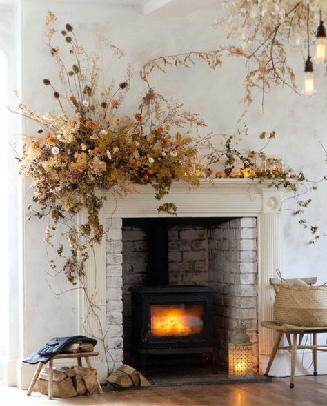 Décor | Holiday Decorating Trend: Sculptural Garlands Traditional Fireplace Mantle, Floral Archway, Decorate For Fall, Flower Installation, Floral Chandelier, Traditional Fireplace, Mantle Piece, Holiday Garlands, Christmas Fireplace